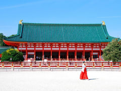 A shrine maiden in front of Heian Jingu Shrine