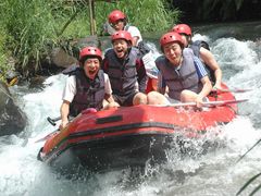 friends on white water rafting adventure in bali