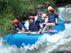 women on rafting adventure in bali indonesia