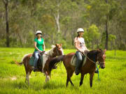 two women horseback ride in Cairns Australia