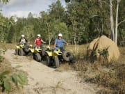 travelers on ATV quad bike adventure in Australia