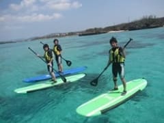 SUP boarding on the clear blue waters of Okinawa