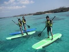 SUP boarding on the clear blue waters of Okinawa