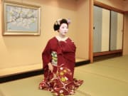 Kyoto maiko in an elegant red kimono