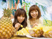 Eating fresh local pineapple at Nago, Okinawa