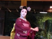 A maiko dancing in Kyoto