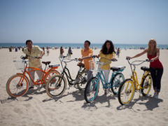 Pedego-couples-on-beach-72dpi-300x199
