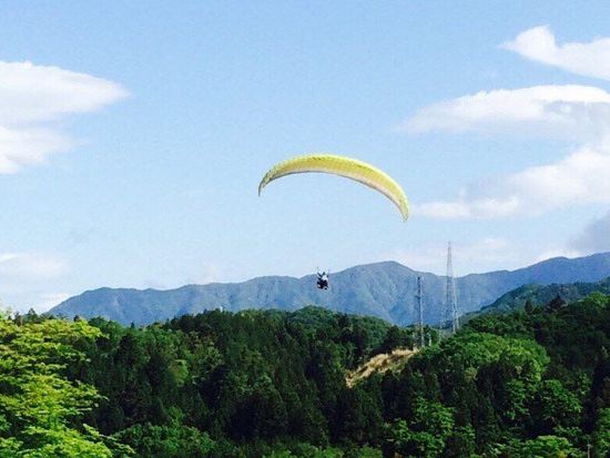 Lifting off over Japan on a paraglider