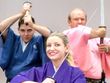 Family posing in samurai outfits in Kyoto