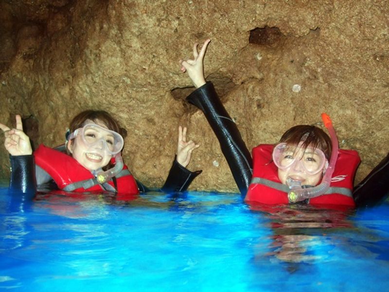 Posing for a picture in the Blue Cave