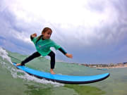 Child surfing in Bondi Beach Australia