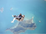 skydive free fall view of an island from above