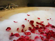 bubble bath tub filled with rose petals jimbaran