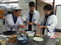 Learning sushi prep from a pro chef