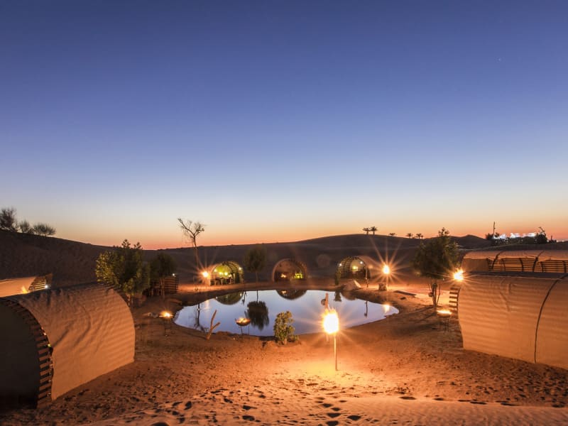 Enjoy a luxury dinner in the desert oasis