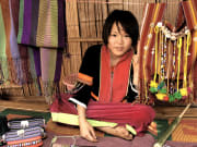 Watch locals make scarves and other handicrafts