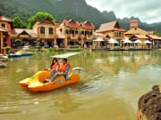 Oriental Village private half day tour pedal boat