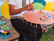 Parasol painted with traditional patterns