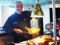 Chef cutting roast