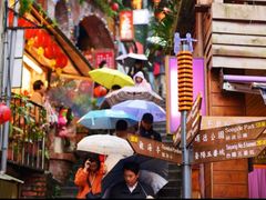 Jiufen Old Street Taipei tourists with umbrellas
