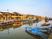 Thu bon river hoi an filled with boats on dock