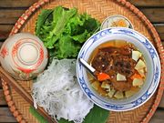 vietnamese meal noodles soup and vegetables