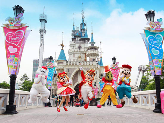 lotte world korea mascots in front of castle