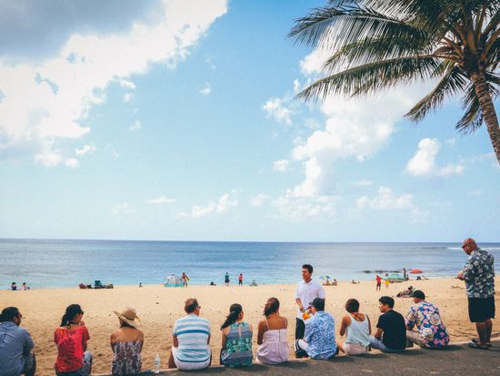 Island and You_07_Group sitting on the north shore beach