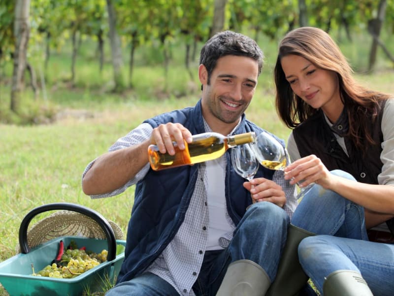 couple enjoying local white wine in hunter valley