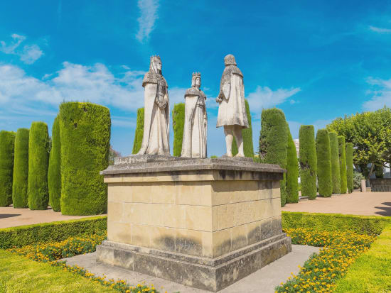 Ferdinan, Isabella and Christopher Columbus in Alcazar de los Reyes Cristianos_shutterstock_612330239