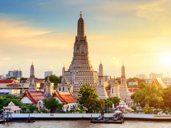 See the majestic Wat Arun from Chao Phraya