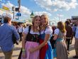 Oktoberfest partygoers in dirndls