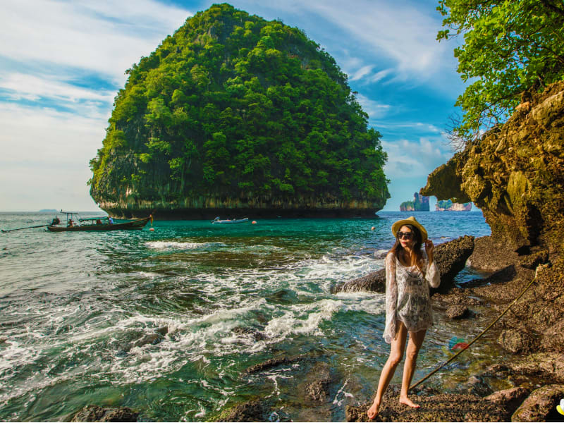 Maya Bay in Phi Phi Woman Posing near the rocks