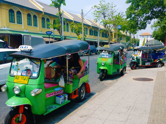 Hop on an iconic tuk tuk and explore Bangkok
