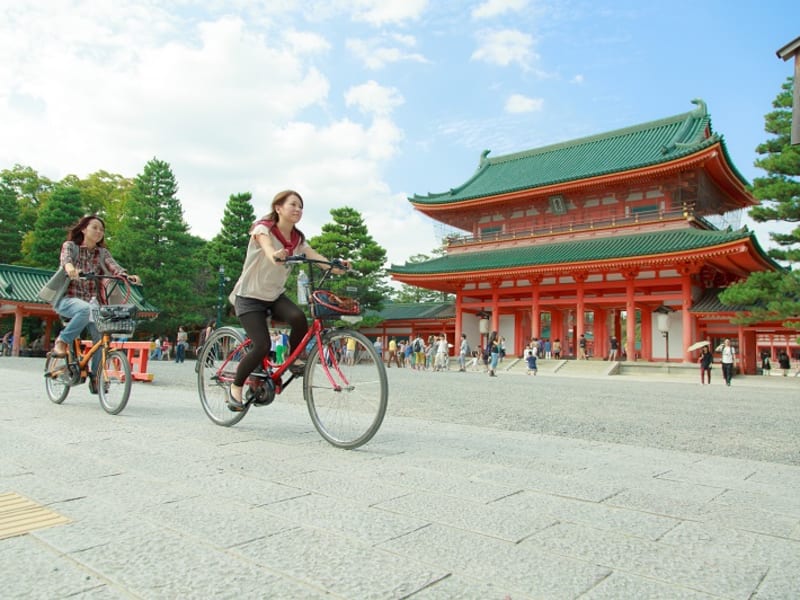 girls on e-bike in front of Heian Shrine in Kyoto