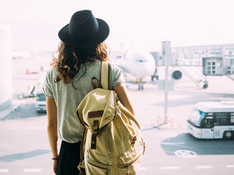 woman, traveller, backpack, hat, airport, airplane