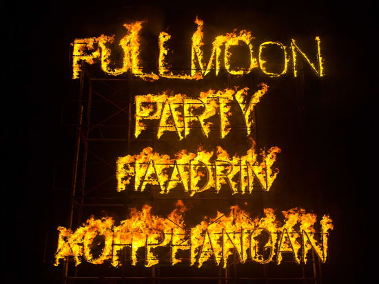 haad rin full moon party signage using fire
