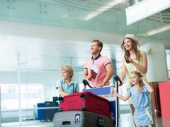 family arriving at the airport