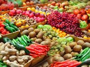 Purchase local goods at an Indonesian market