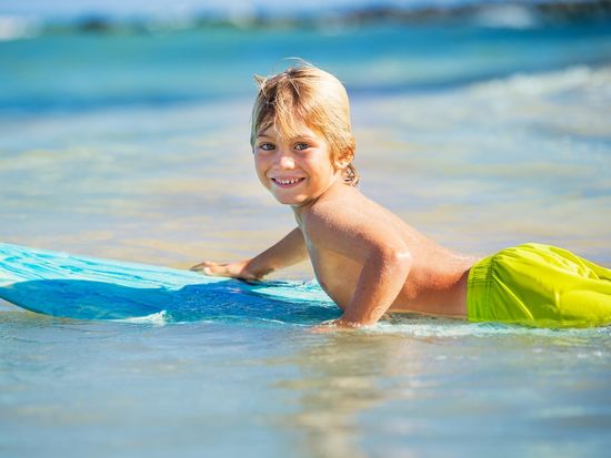 Surf_Lesson_shutterstock_162352100