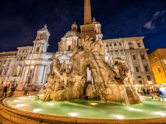 Italy_Rome_Piazza_Navona_Fountain_of_Four_Rivers_Night_shutterstock_199187087