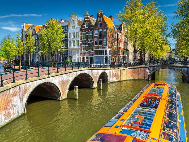 Netherlands_Amsterdam_canal_boat_shutterstock_662087905