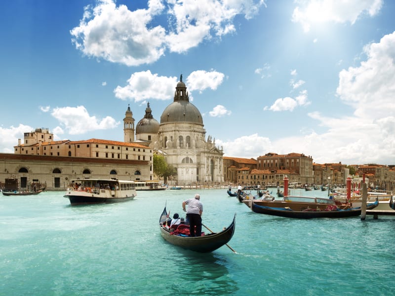 Italy_Venice_gondola_boat_canal_Basilica Santa Maria della Salute_shutterstock_116504368