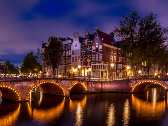 Netherlands_Amsterdam_night_canal_shutterstock_699440848