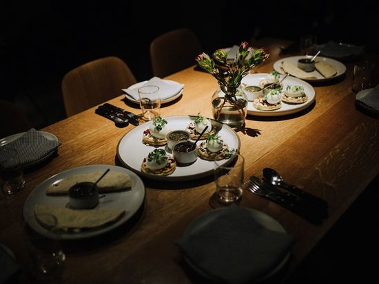 Dacia Pierson. Flatiron Food Tour. Table set and ready for guests at cosme