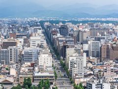 pixta_24009985_烏丸通と京都の町並み