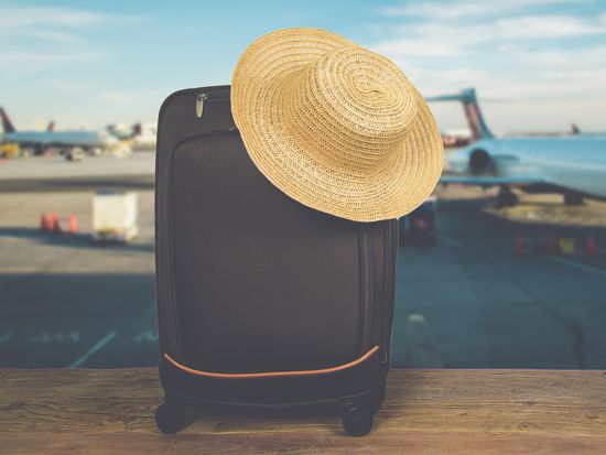 Airport_Suitcase_Luggage_Airplane_Summer_Transportation_shutterstock_590220761