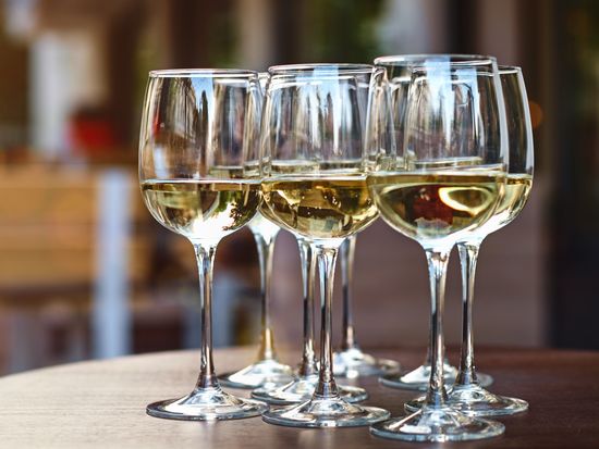 Generic_Drink_White wine tasting on winery terrace_pixta_69212007_XL