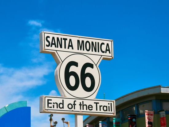 USA_Los Angeles_Santa Monica road sign_route 66 end of the train_shutterstock_621485867