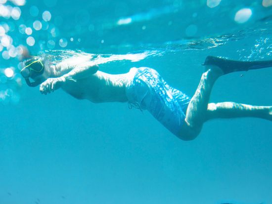 Snorkeling_Swimming_Under_Water_shutterstock_568329076